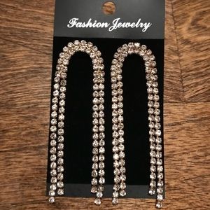 Dangle gold tone earrings